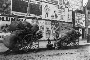 Ragmen with carts on a New York City street circa 1896