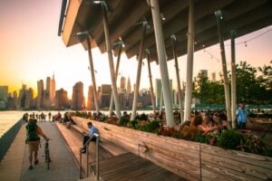 Gantry Plaza State Park at sunset with the Midtown Manhattan skyline across the East River