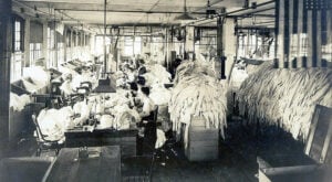 Workers inside the Shaughnessy Knitting Mill in Watertown, New York, circa the 1910s