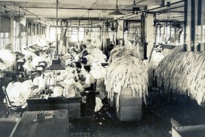 Workers inside the Shaughnessy Knitting Mill in Watertown, New York, circa the 1910s