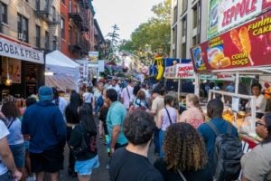Crowds and food vendors at the Feast of San Gennaro in Little Italy, New York City