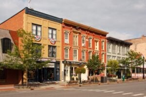 Historic storefronts and local businesses along Main Street in Cooperstown, New York