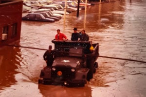 New York National Guard driving through flooded streets in Elmira during the 1972 flood to rescue stranded residents