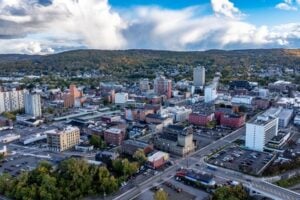 Aerial view of downtown Binghamton, New York, surrounded by the hills of the Southern Tier