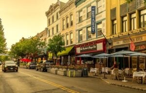 Historic buildings, restaurants, and outdoor dining along Main Street in Nyack, New York