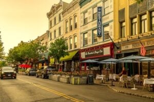 Historic buildings, restaurants, and outdoor dining along Main Street in Nyack, New York
