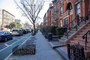 Brownstone-lined Brooklyn neighborhood street in New York City