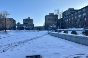 Snow-covered SUNY Plattsburgh campus in Plattsburgh, New York, during winter.