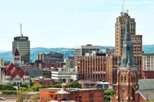 View of the downtown Syracuse, New York skyline with historic buildings and churches
