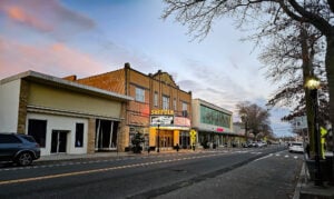Downtown Riverhead street scene with the historic Suffolk Theater on Long Island’s North Fork