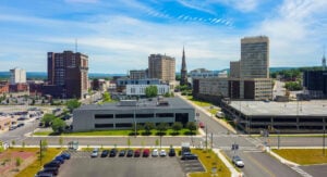Panoramic view of downtown Utica, New York, showing historic buildings and the city skyline