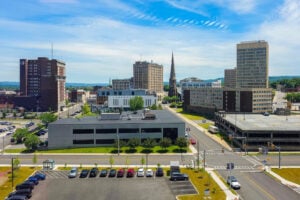 Panoramic view of downtown Utica, New York, showing historic buildings and the city skyline