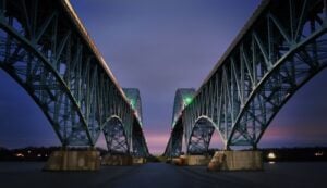 Twin spans of the South Grand Island Bridge crossing the Niagara River at dusk in Erie County, New York.