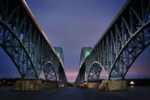 Twin spans of the South Grand Island Bridge crossing the Niagara River at dusk in Erie County, New York.