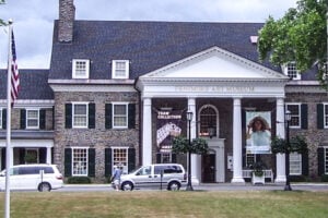 Fenimore Art Museum in Cooperstown, Upstate New York, featuring its historic stone building and columned entrance.