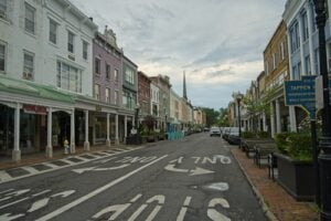 Historic Wall Street in Kingston, New York, lined with colorful storefronts and buildings in the Stockade District